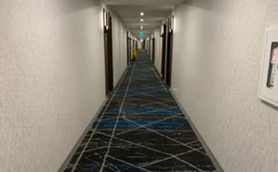 Carpet cleaning in a commercial hallway